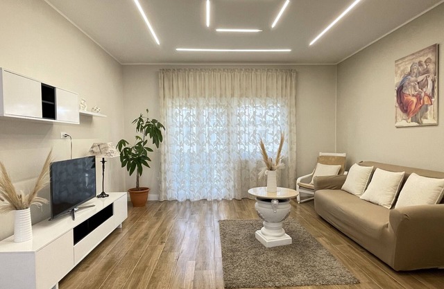 Apartment located within a park with free parking space.