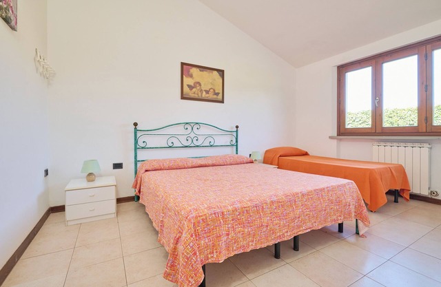 Ferienwohnung "Mare Etrusco Villetta D1" mit Privatem Garten und WLAN