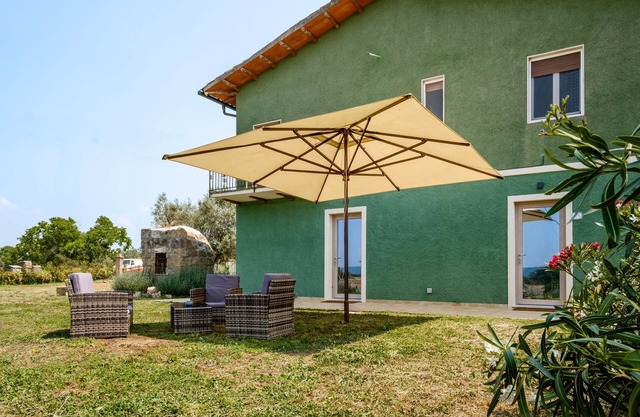 Ferienwohnung 'Mimosa' mit Gemeinschaftsgarten und Klimaanlage