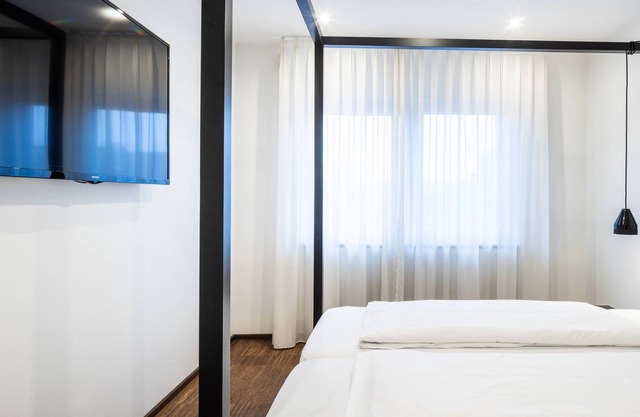 Apartment mit Balkon sowie mit voll ausgestatteter Kochnische