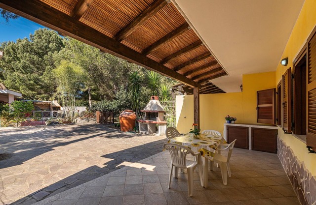 Ferienwohnung 'Oasi Blu Porto Pino' mit Terrasse, Garten und WLAN