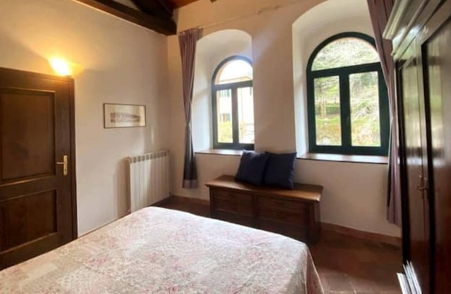 Apartment on the river in a historic village