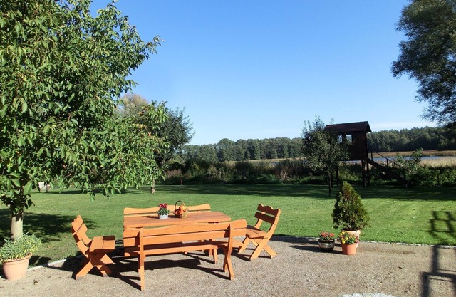 Ferienwohnung Fischadler - Ferienwohnungen am Federower Hofsee
