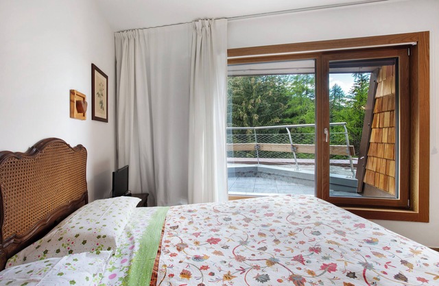 Ferienwohnung 'Pino' mit Bergblick, privater Terrasse und Gemeinschaftsgarten