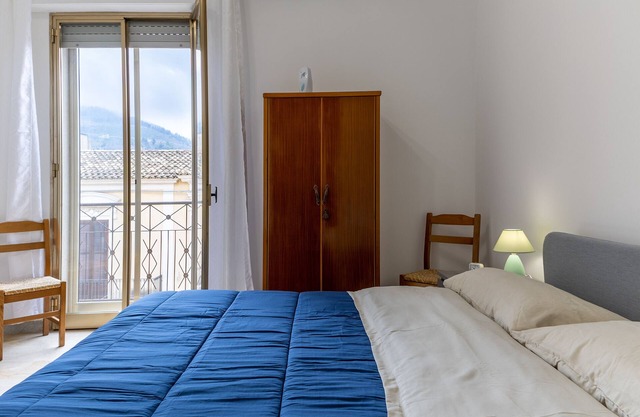 Ferienwohnung 'Pollicita 80' mit Bergblick und Balkon