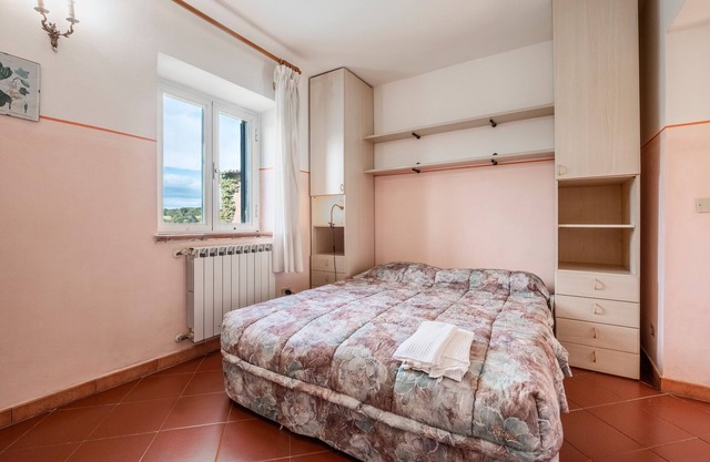 Ferienwohnung 'Porcilaia' mit Gemeinschaftspool, privater Terrasse und Gemeinschaftsgarten