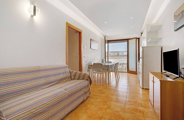 Ferienwohnung 'Residenz Papaya A202' mit Gemeinschaftspool und privater Terrasse