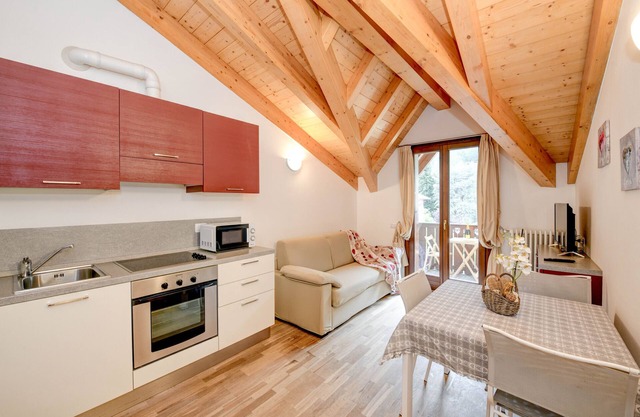 Wohnung 'Rosa delle Dolomiti Bilocale3' mit Bergblick & Gemeinschaftssauna