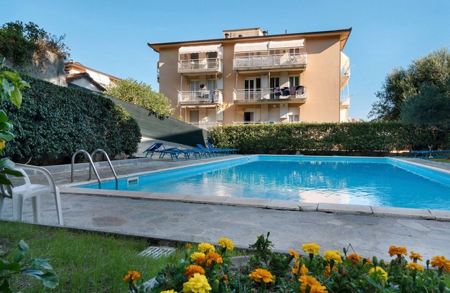Apartment 'Sole E Mare' with Shared Pool, Private Terrace and Private Garden