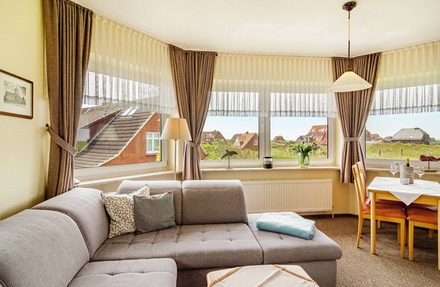 Ferienwohnung 'Strandhus Uiterst-hörn Treibholz' mit Meerblick, Gemeinschaftsgarten und WLAN