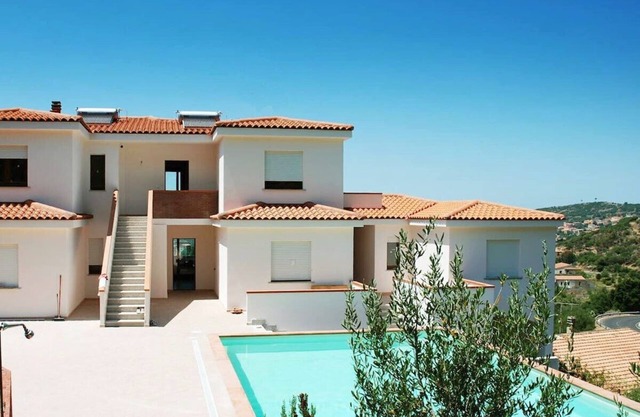 Apartment Suono del Blu in charming residence with the pool in Badesi