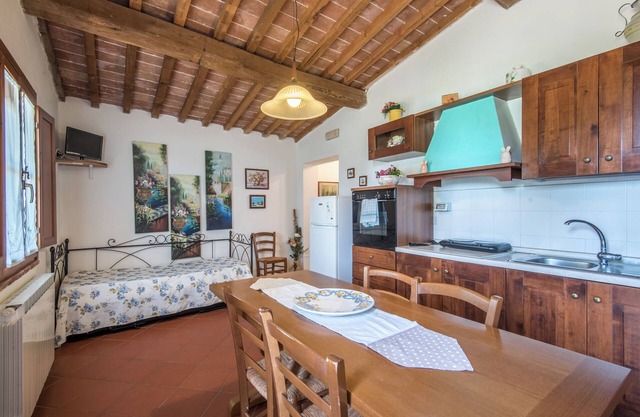 Ferienwohnung "Trilocale Etrusco" mit Gemeinschaftspool, Garten & WLAN