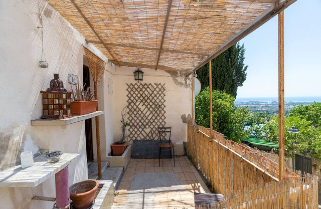 Ferienwohnung 'Un Pezzo di Storia vicino al Mare' mit Garten