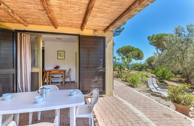Apartment 'Villa Conti - Trilocale 13' with Private Terrace, Shared Garden and Wi-Fi