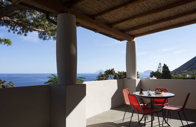 Apartment with spacious terrace overlooking the sea in a villa with swimming pool and garden