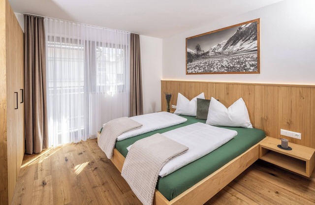 Ferienwohnung 'Zum Sonnentor - Larix' mit Bergblick, Balkon & WLAN