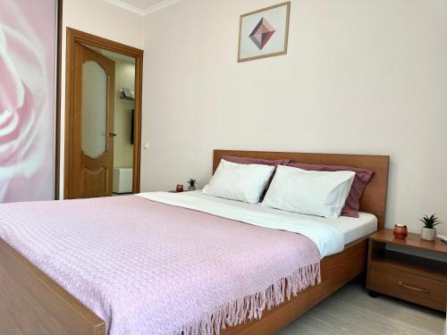 Apartments with a coffee machine in the city center, near a park and Zlata Plaza