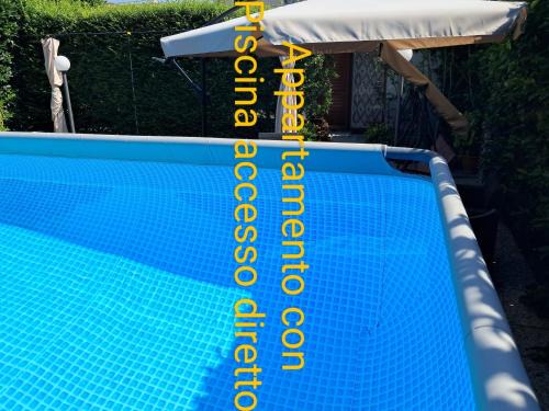 Appartamento con accesso diretto in piscina privata uso esclusivo