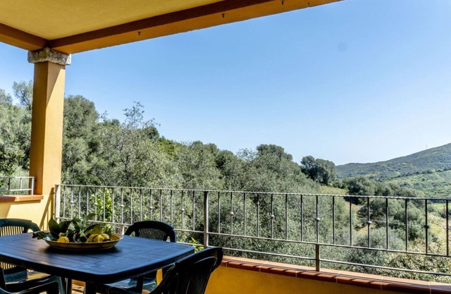 Appartamento Dodi | Erste Stock, Schlafzimmer und Blick auf die Veranda!