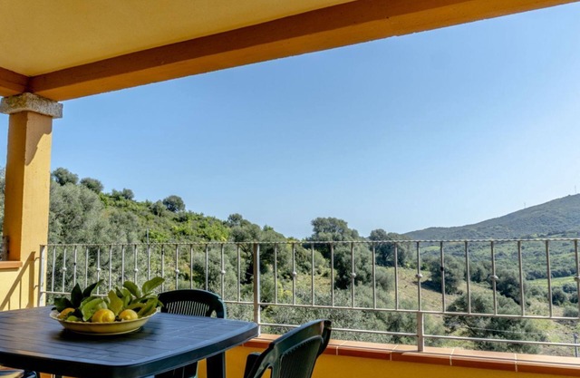 Appartamento Dodi | Zweiter Stock, Schlafzimmer und Blick auf die Veranda!