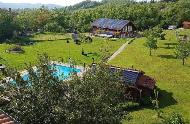 Wohnung "Holzhaus 3" mit Pool, Sauna, Garten