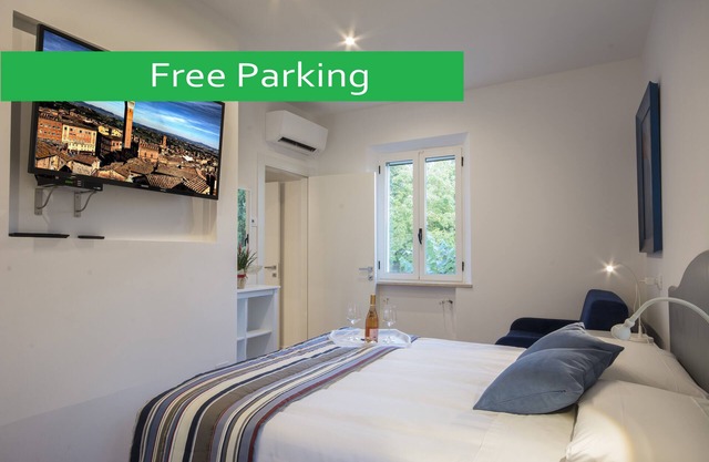 Appartement Mit Garten - 1 Schlafzimmer (2 km vom Zentrum entfernt). Kostenlose Parkplätze