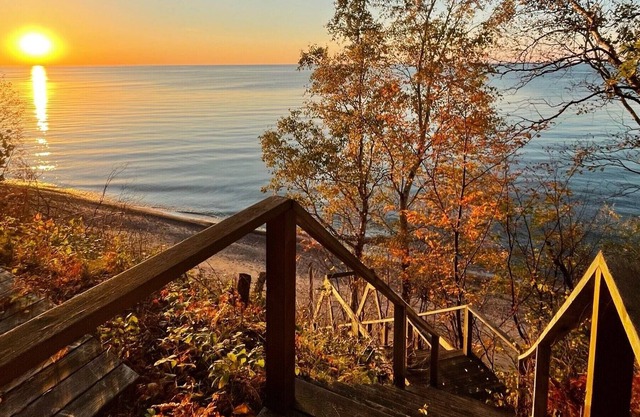**Artistry view of Lake Superior with the allurement of Upper Entry Lighthouse *