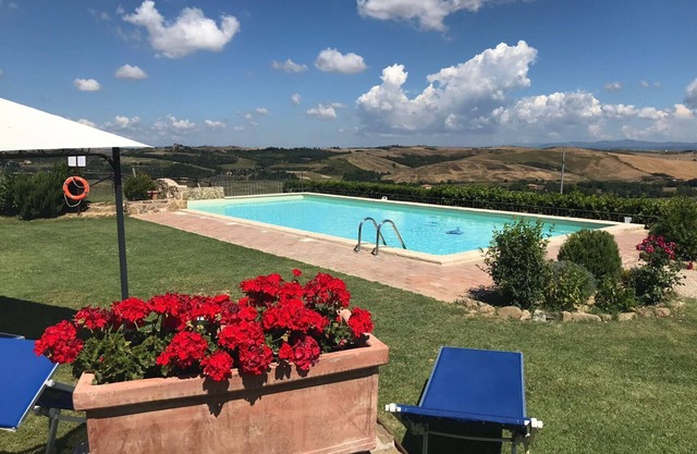 at Podere Ampella , 2 Storey Stone house with private garden and share pool