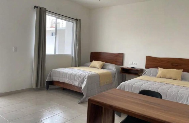 Avenida Suites