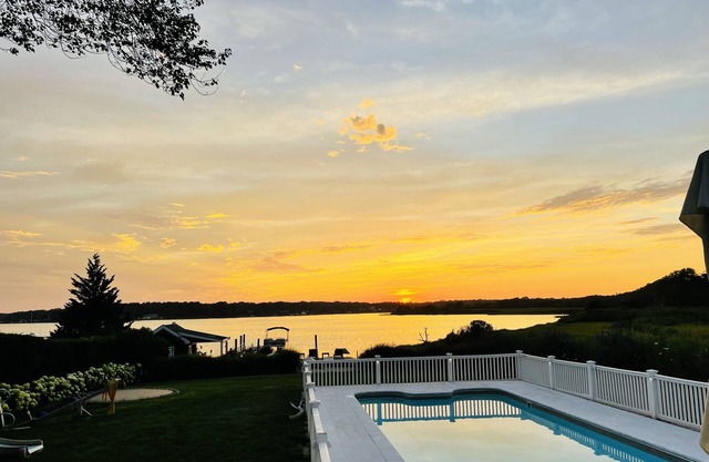 Bay front Hamptons home with direct sunsets and private dock with pontoon boat