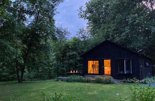 Be in Nature at this Gorgeous Riverfront Cabin