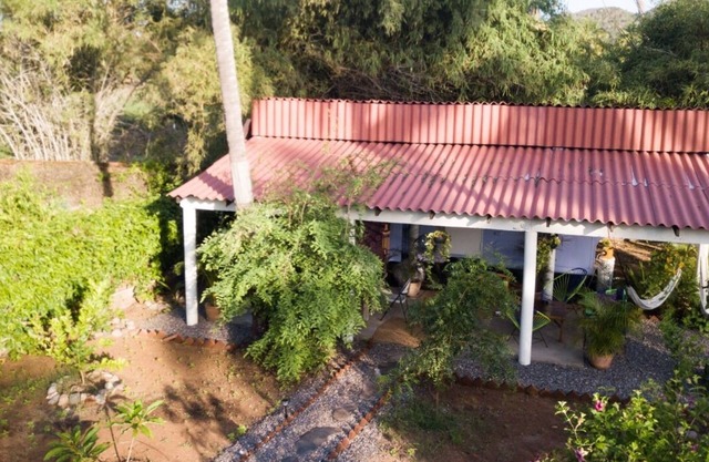 Beach Accommodation in organic garden. in the middle of Nature. Secret surf spot