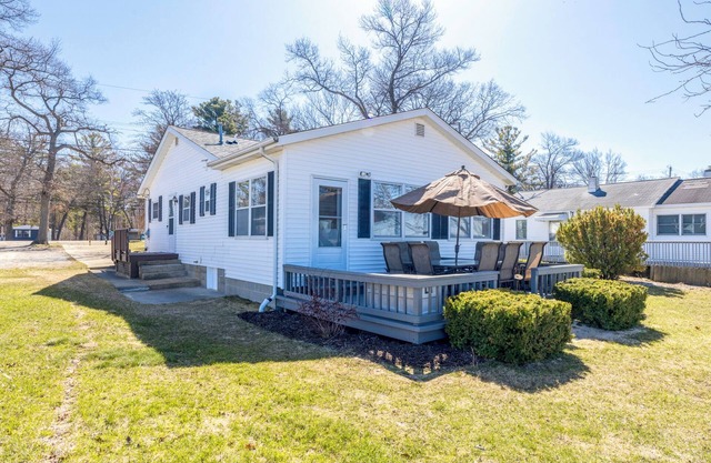 Beach House in Caseville w/50ft sugar sand Lake Huron frontage on the property.
