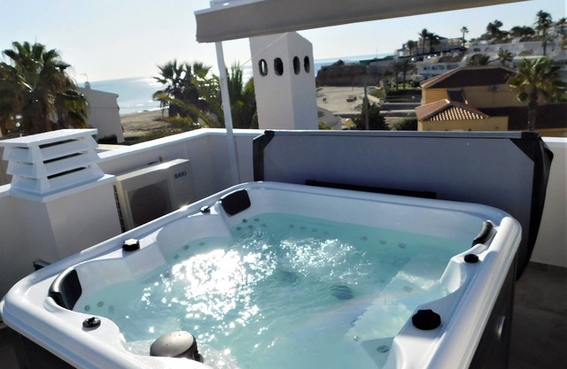 Beach House sleeps 6 with 3 Terraces, Jacuzzi Hot Tub, Full Air con , WIFI