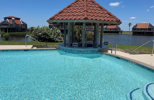 Beach Retreat Minutes to the Beach and just steps to the Pool!!