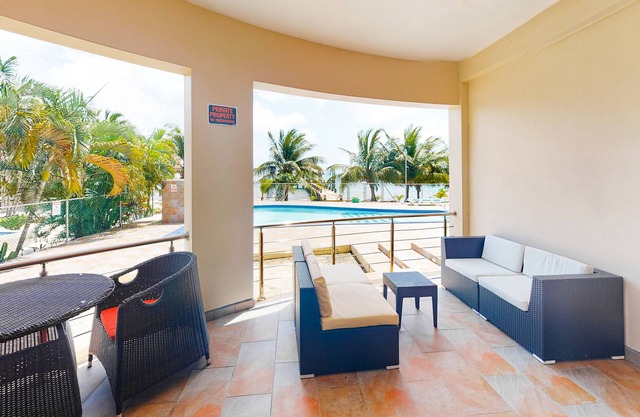Apartment am Strand mit herrlicher Aussicht, Küchenzeile und Gemeinschaftspool