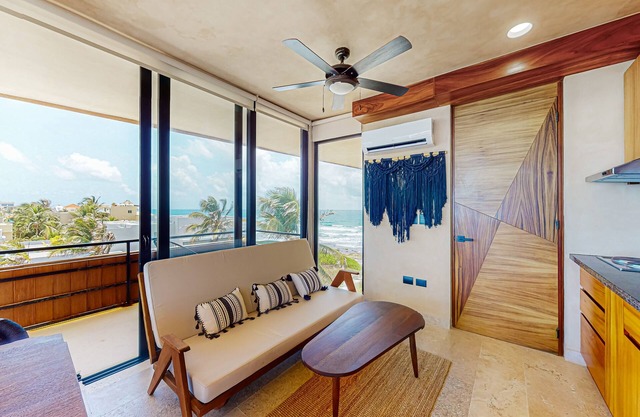 Beachfront apt on the beach with community pools, kitchenette, AC, hammock