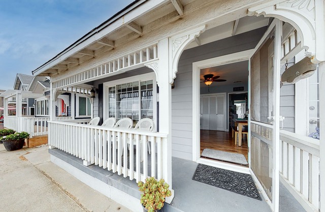 Charming oceanfront house with beach views and enclosed BBQ area