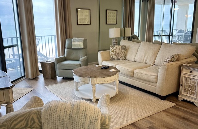 Beachfront Condo just a quick walk on the boardwalk to the sandy beach!