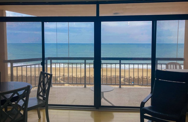 Beachfront condo with bay/ocean views, outdoor pool, & tennis courts