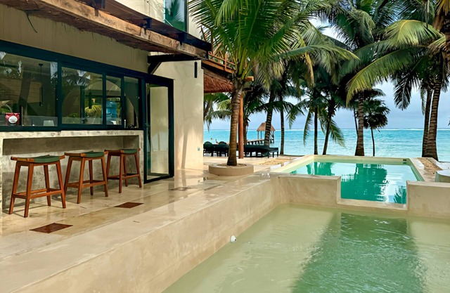 Beachfront home with private heated pool, jacuzzi, sauna, ocean views & AC