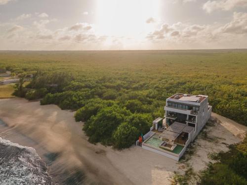 Beachfront luxury villa with pool with private cooker & staff