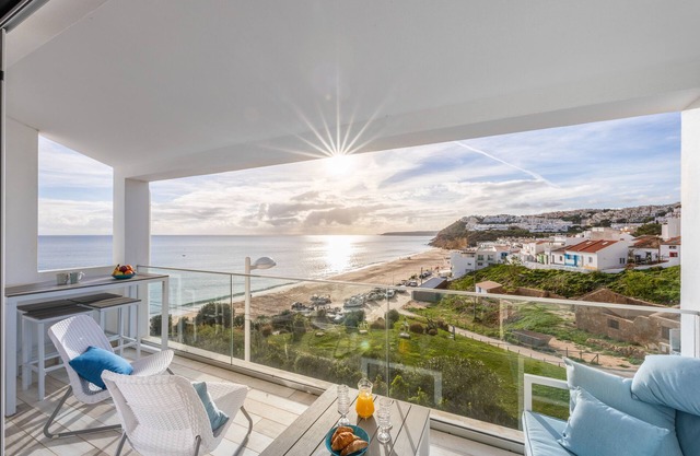 Beachfront villa + studio with hot tub