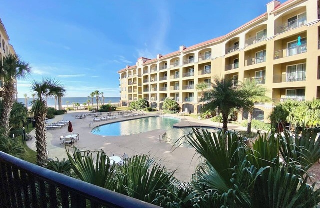 Beautiful 2 bedroom poolside condo with majestic beach view