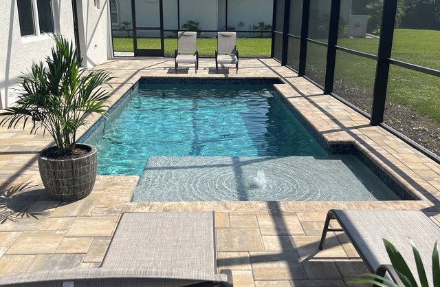 Beautiful 3-bedroom villa with heated pool, lanai & 5 miles from the beach!