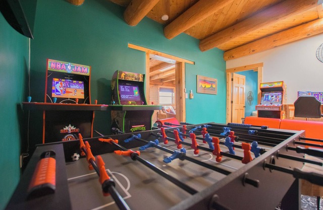 Beautiful and fun 5 bedroom house with a hot tub, arcade games and lots of room.