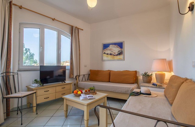 Gemütliche Wohnung mit Klimaanlage, Pool, W-LAN, TV, Terrasse, Haustiere erlaubt und Parkplatz
