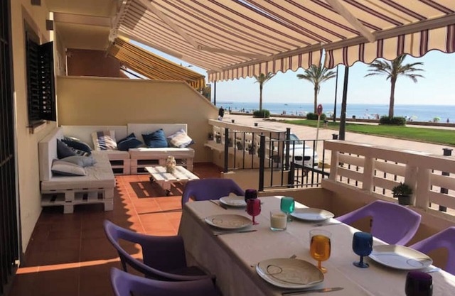 Beautiful apartment with large terrace on the beach in Porto Zaparaya