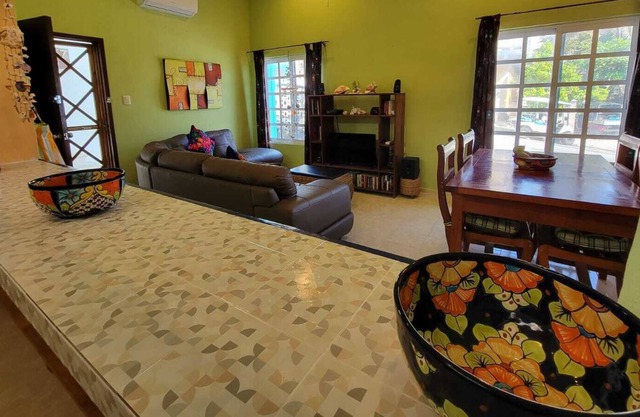 Beautiful Caribbean ocean front condo. Walk to great food, bars and spas........