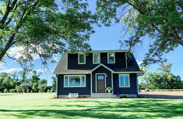 Beautiful cozy country home located on 12 acres in a great farming community.